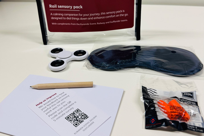 Sensory pack including a soft eye mask, earplugs, a notebook and pencil, and a fidget to spin away stress