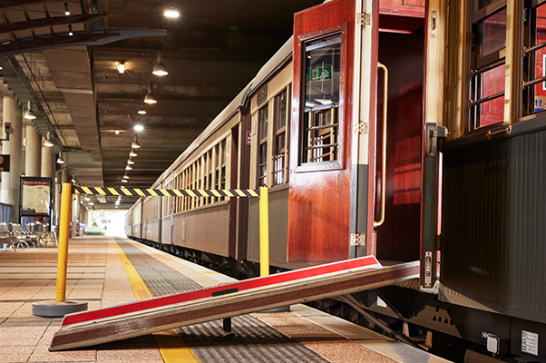 A ramp provides mobility device access to the train.