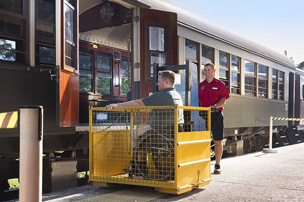 Boarding with the hydraulic lift – wheelchair.